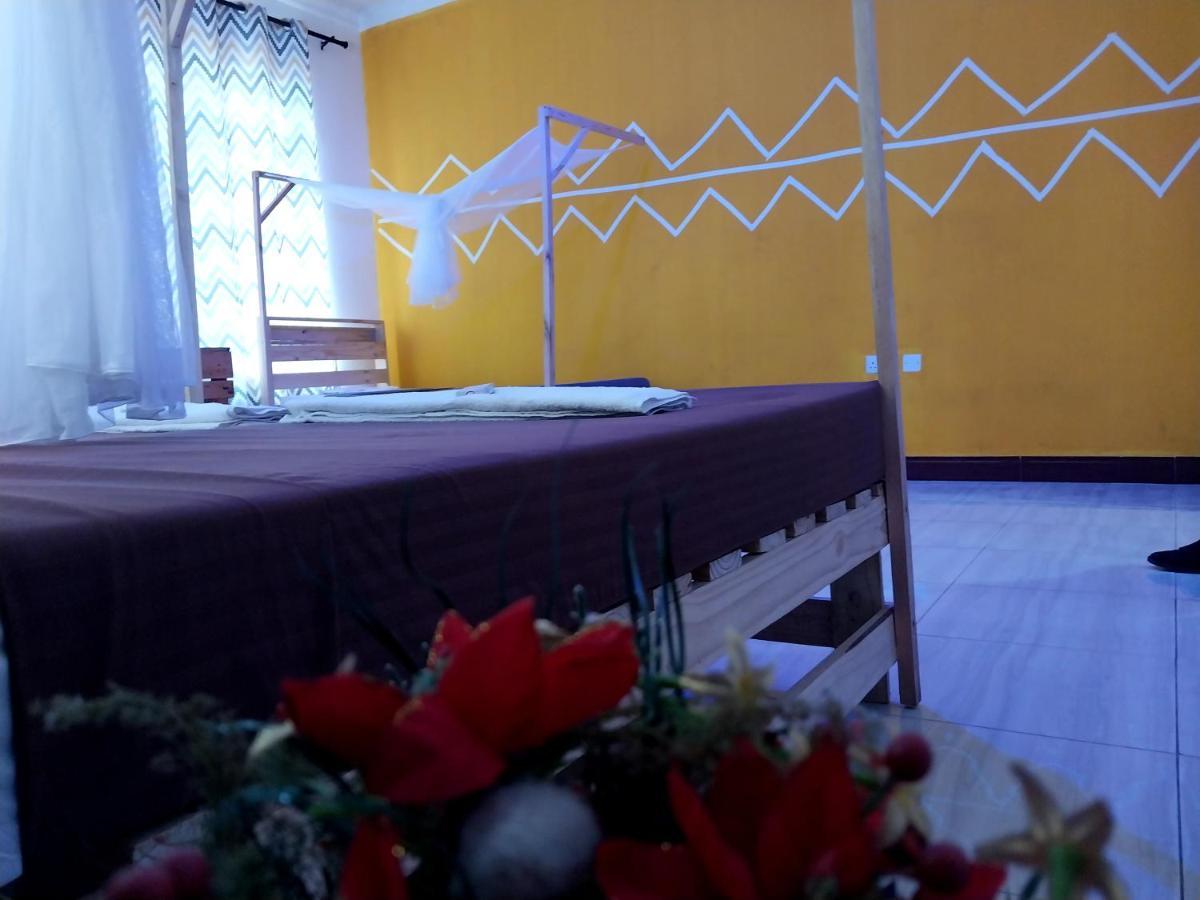 L&J Modern Backpackers Kigamboni Beach House Bed & Breakfast ดาร์เอสซาลาม ภายนอก รูปภาพ